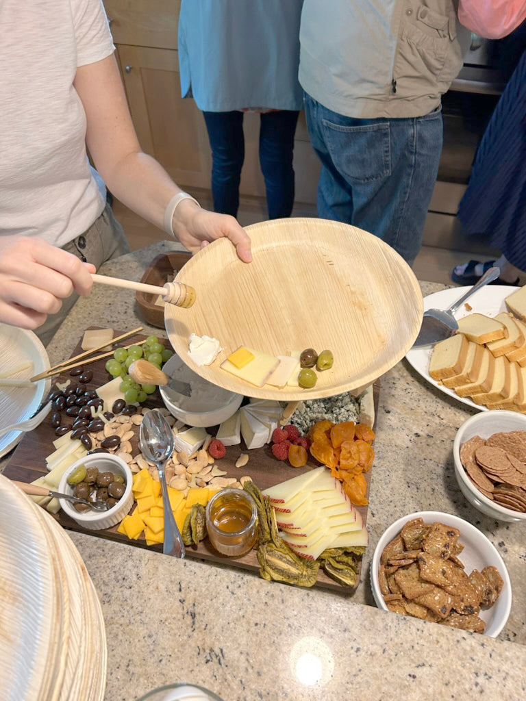NEATtable compostable palm leaf plate being used at a brunch.