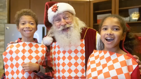 Santa Claus and the Kerr kids wearing NEATsheets.