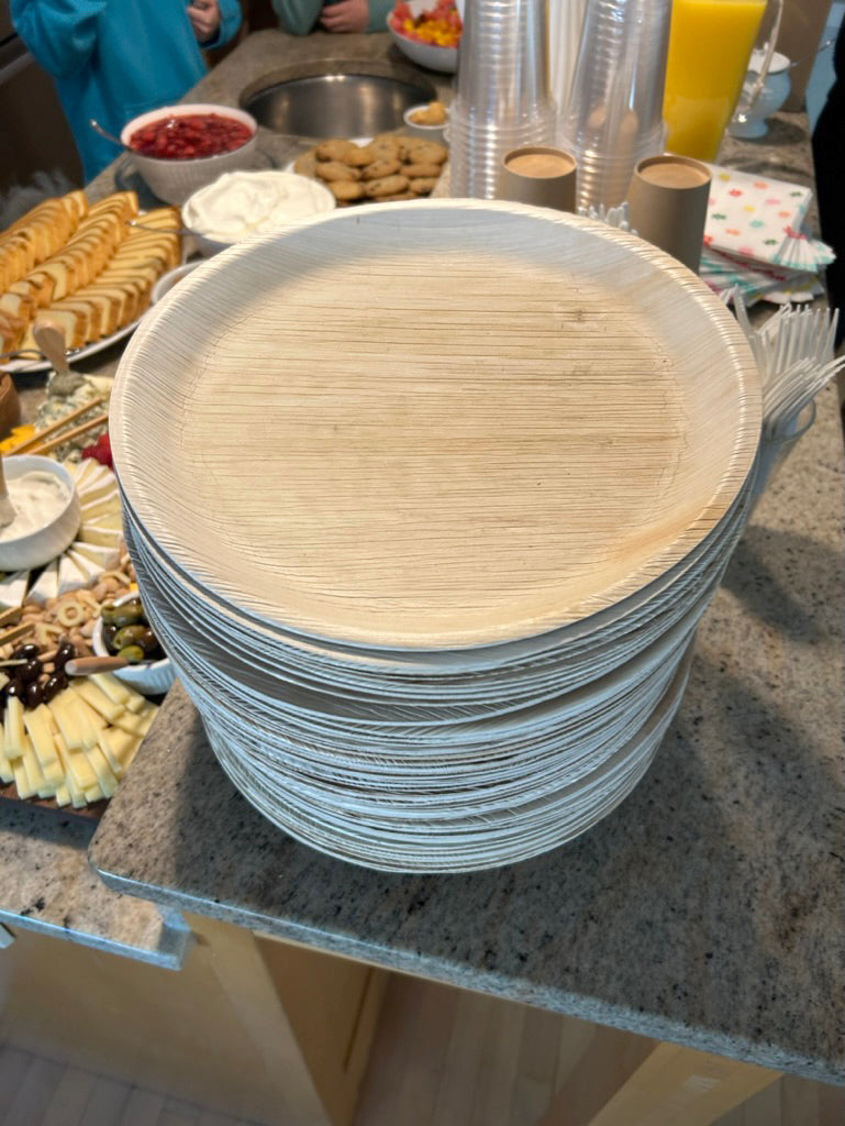 NEATtable compostable palm leaf plates at a brunch.