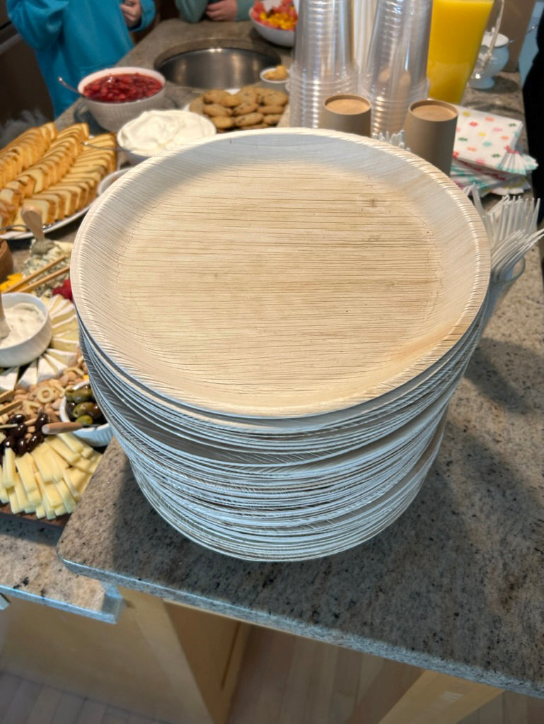 NEATtable compostable palm leaf plates being used at a brunch.